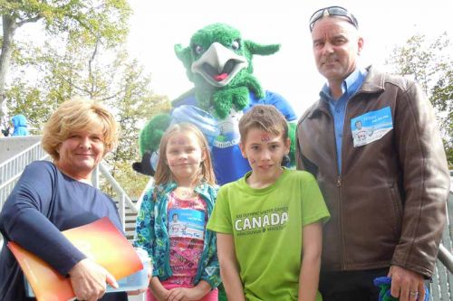 Cathy Reynolds, Kylie Babcock, Dylan Walker, Vice-principal James McDonald and Grif at GREC's “Double the Dream” fundraiser celebrating the 35-year anniversary of Terry Fox's Marathon of Hope